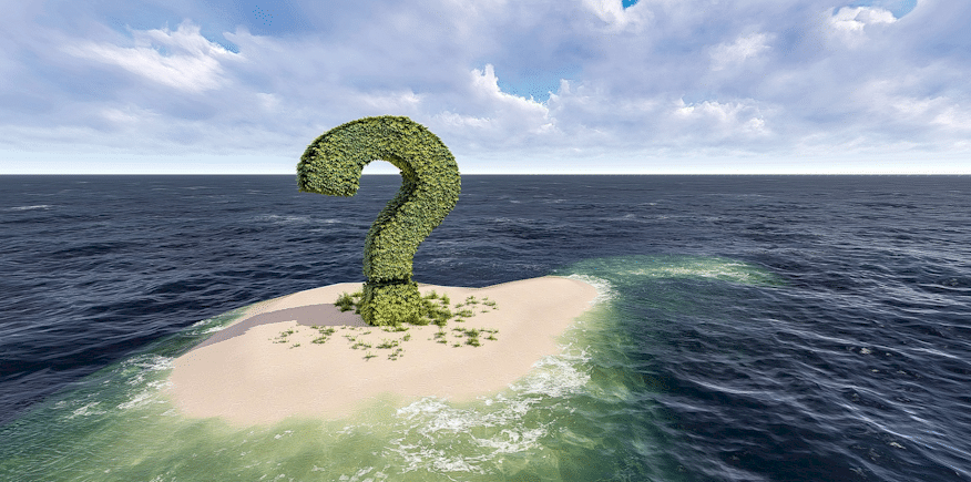 Symbolbild: kleine Sandbank mit einem großen grünen Fragezeichen